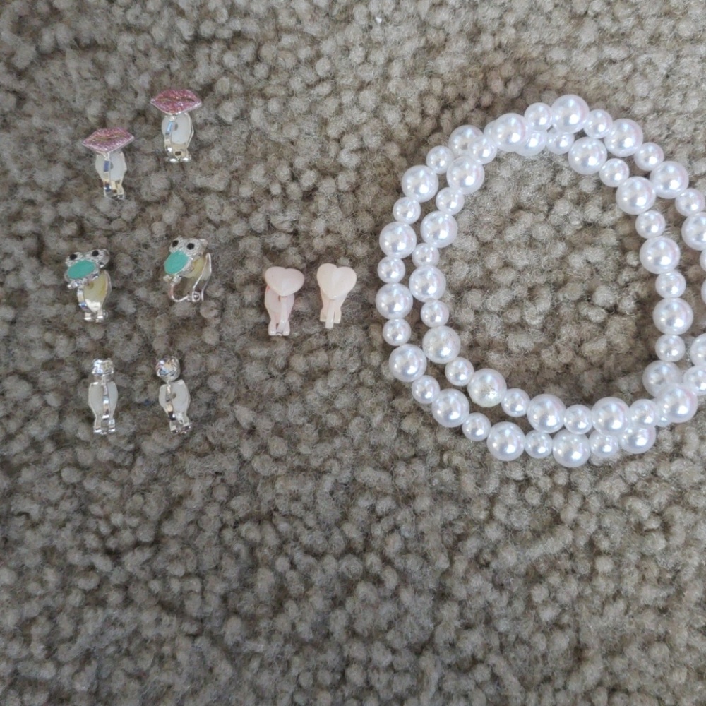 Clip on earrings and two pearl bracelets